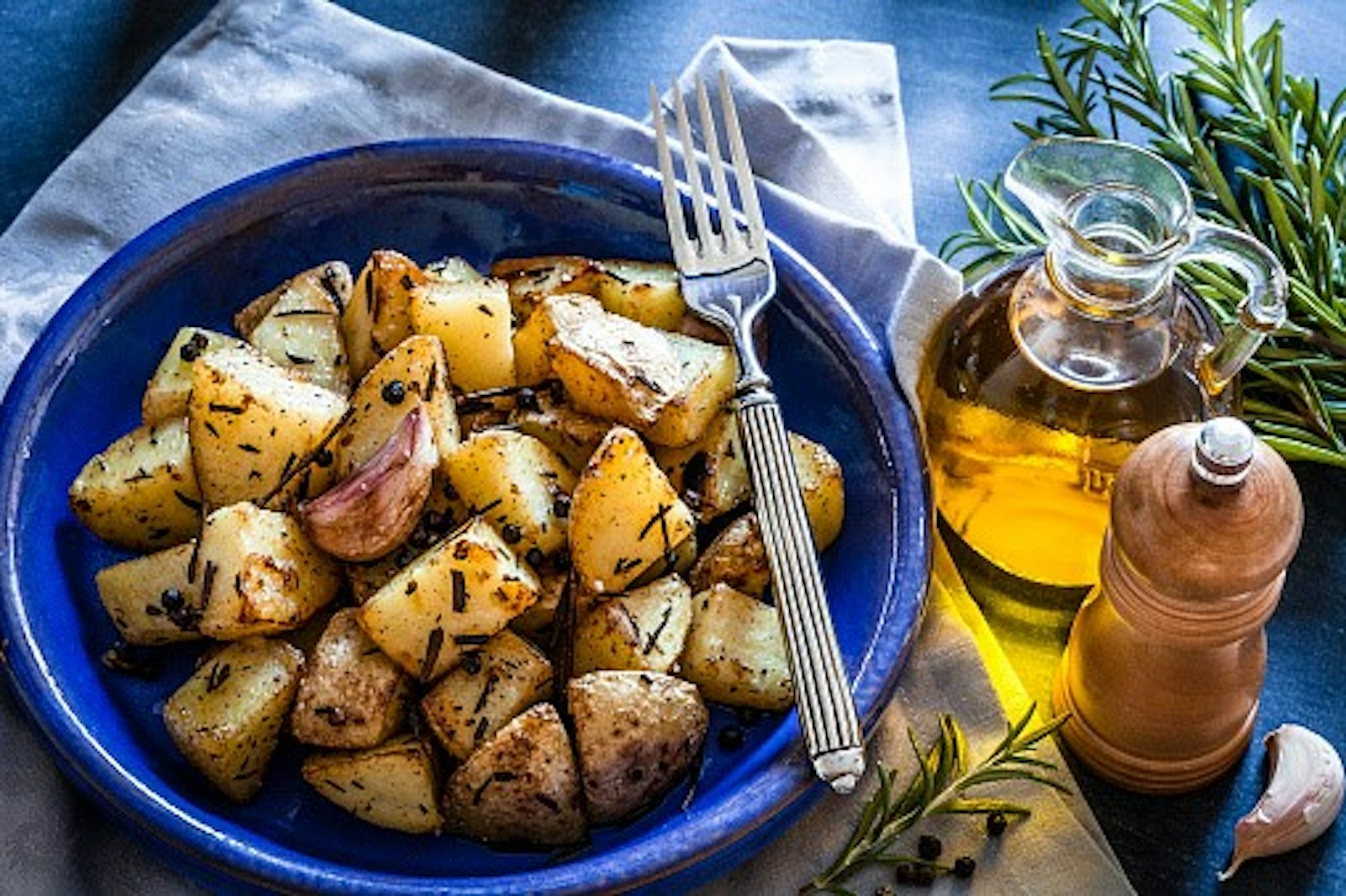 Roast potatoes with olive or avocado oil