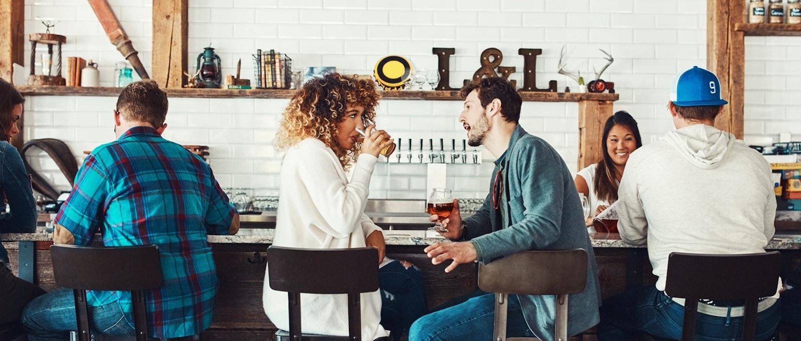 man and a woman at the bar