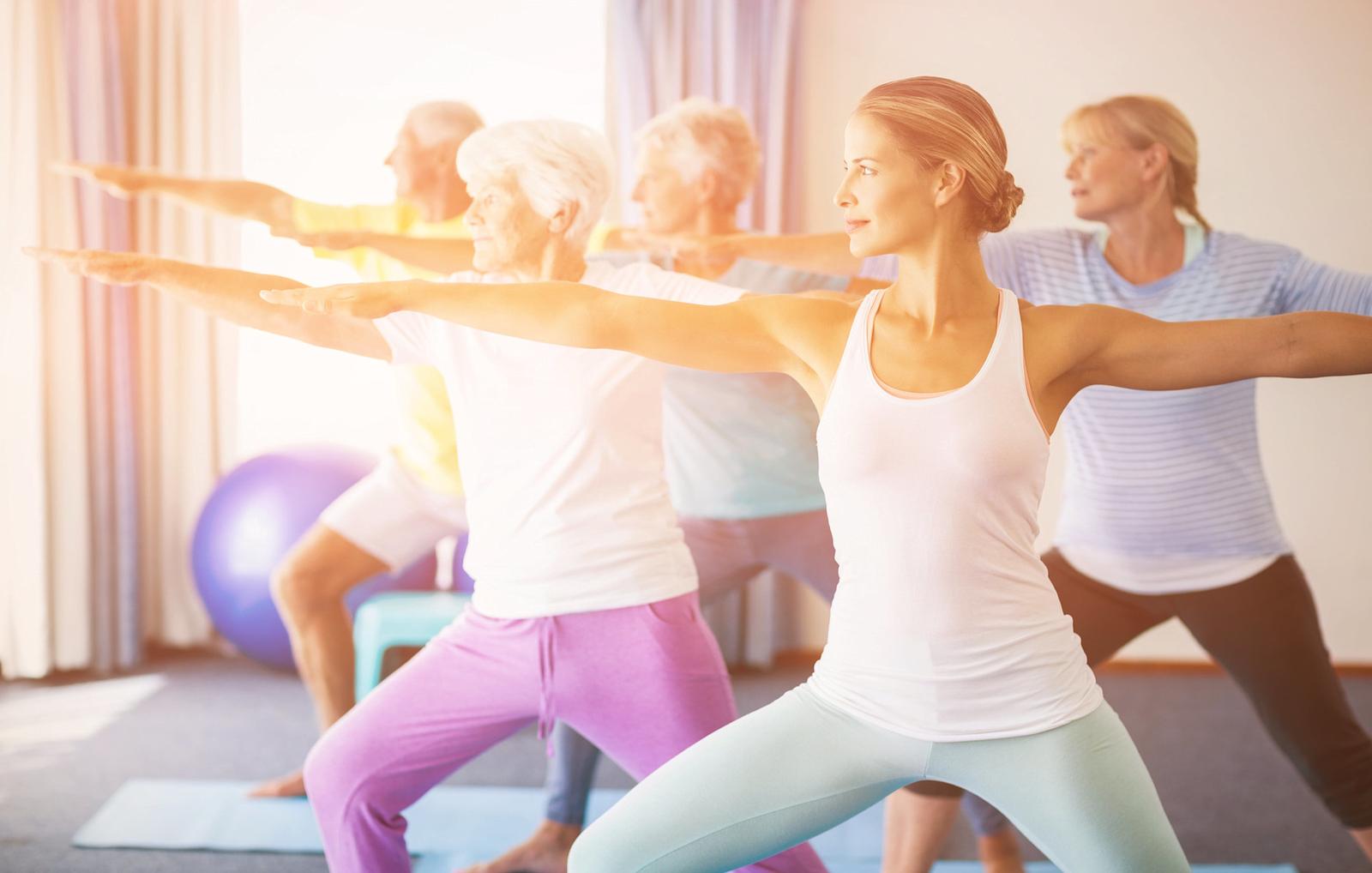 Women taking part in a yoga class.
