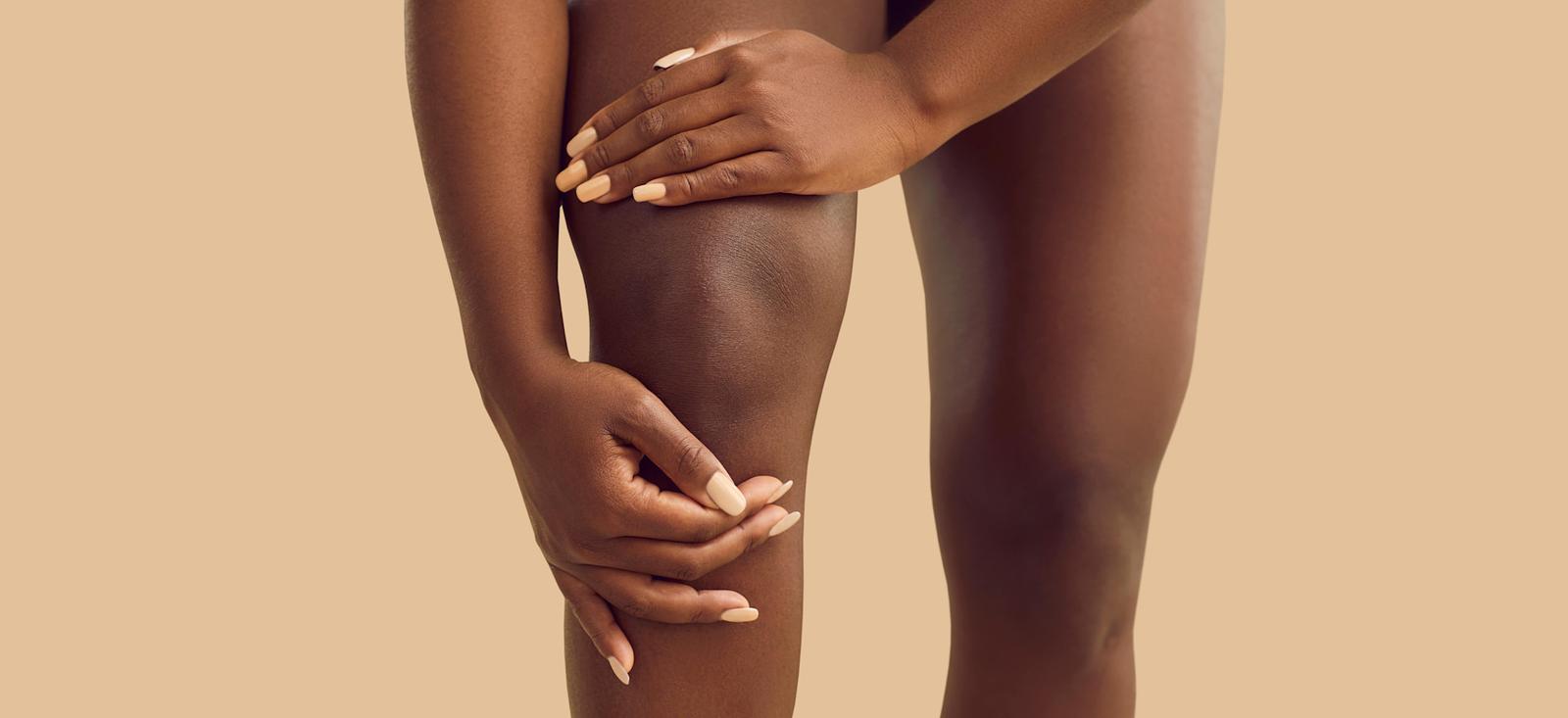 A close up of a woman's knees.