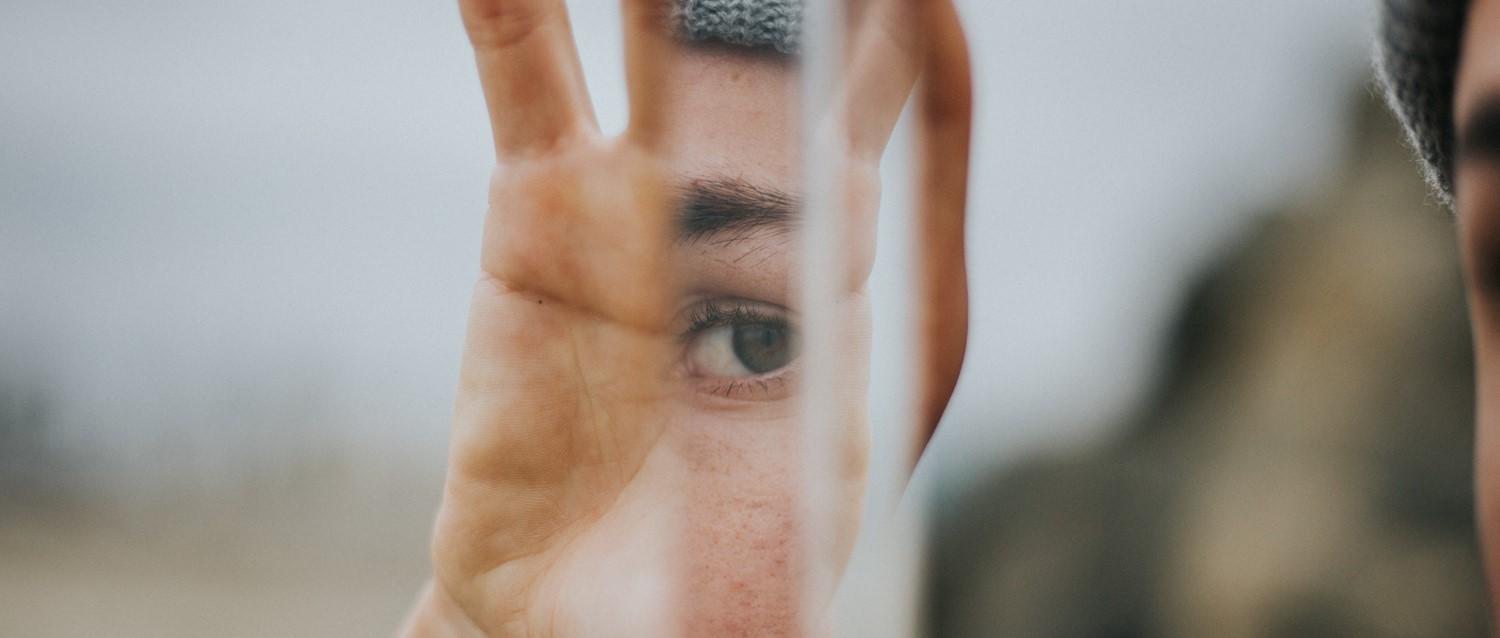 How do skin conditions impact mental health?