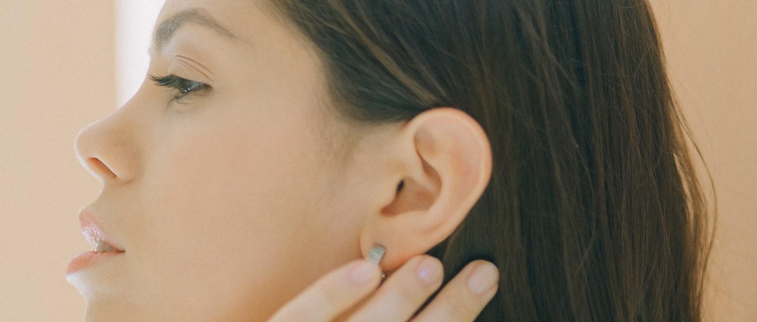 Why has the advice on treating excess earwax changed?